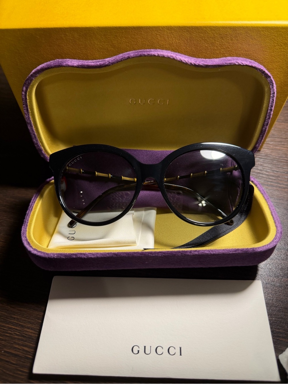 Gucci Black Round Gradient Sunglasses with Subtle Gold Temples